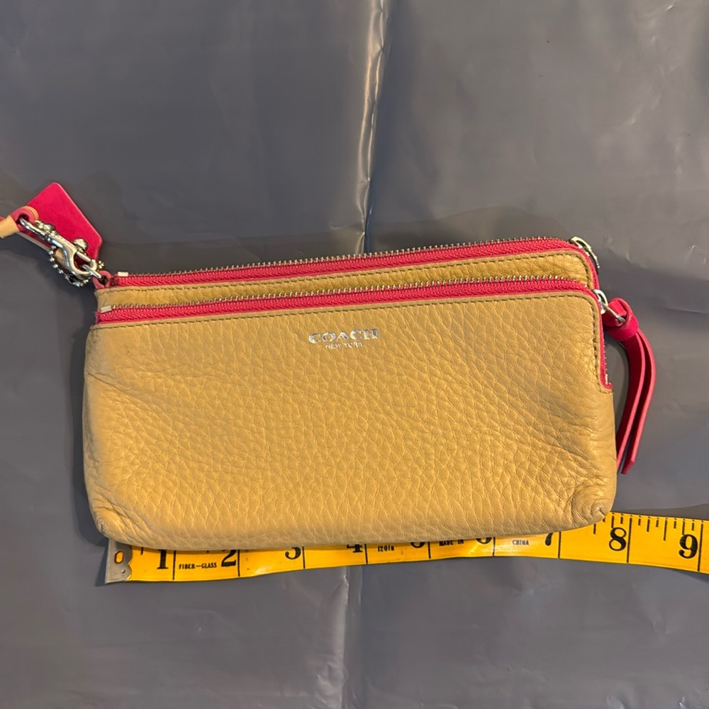 Coach Bleecker tan and pink pebbled leather wallet wristlet